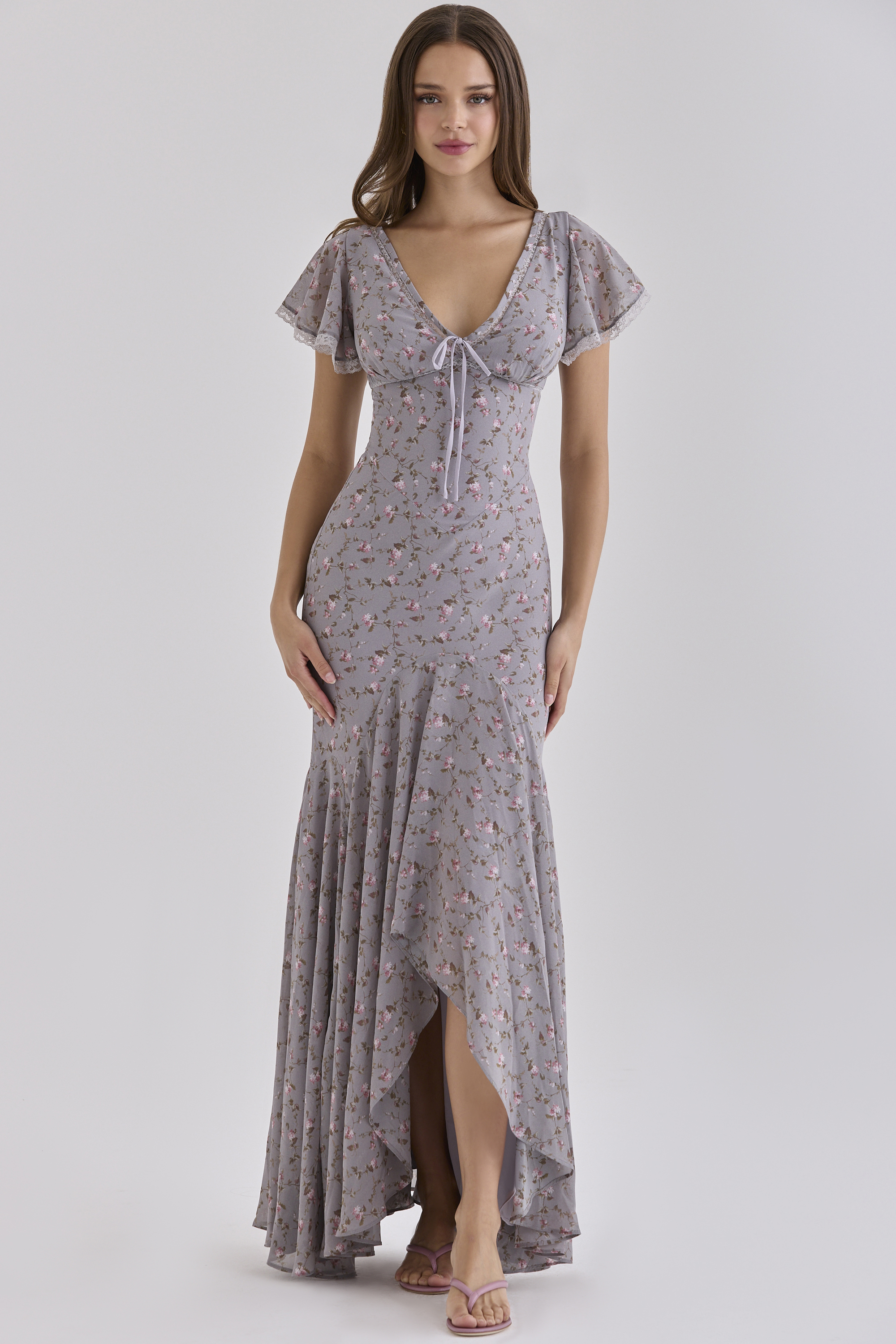 House of CB Amina lilac floral maxi dress with cap sleeves and a cascading asymmetric skirt.