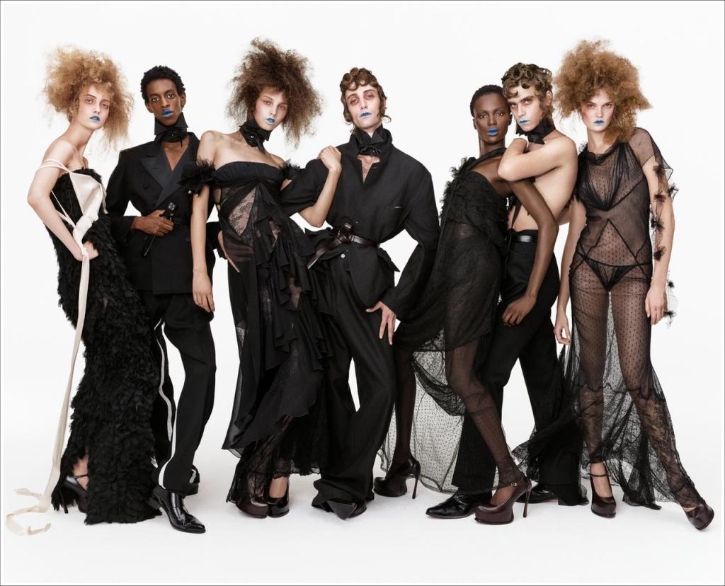 Seven models wearing black looks from Zara x John Galliano’s Re{form} campaign.
